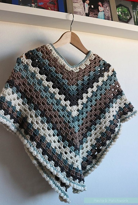 Granny poncho with a simple collar and bobble edge