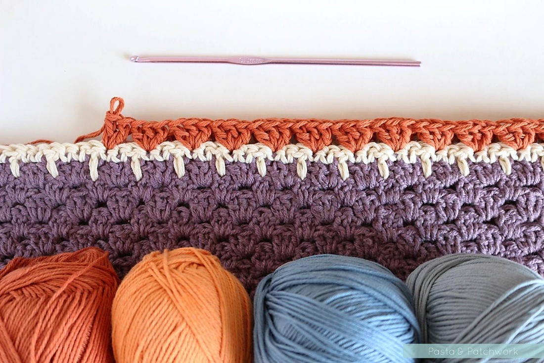 Purple and burnt orange Nordic Shawl - pattern by Anette Ciccarelli